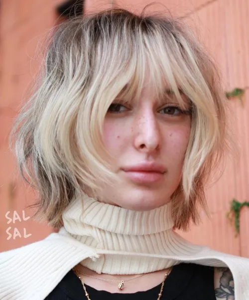 14-shaggy-bob-with-bangs-and-platinum-blonde-highlights