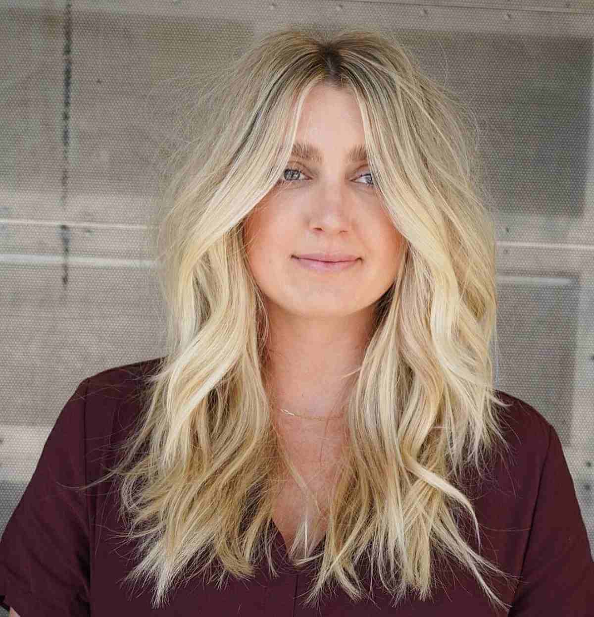 Blonde Medium-Length Shaggy Cut for Round Faces