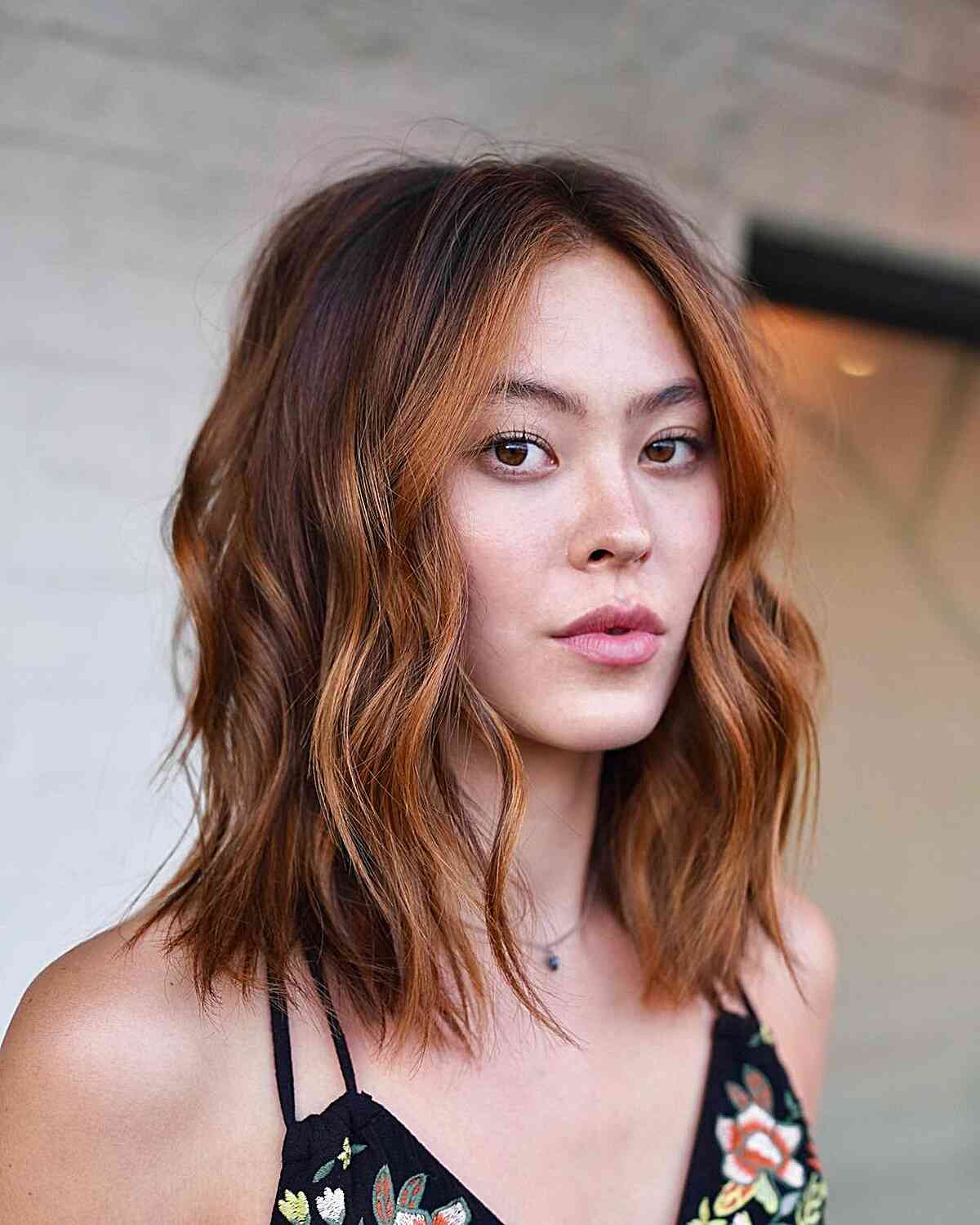 Face-Framing Auburn Balayage on a Mid-Length Choppy Layered Cut