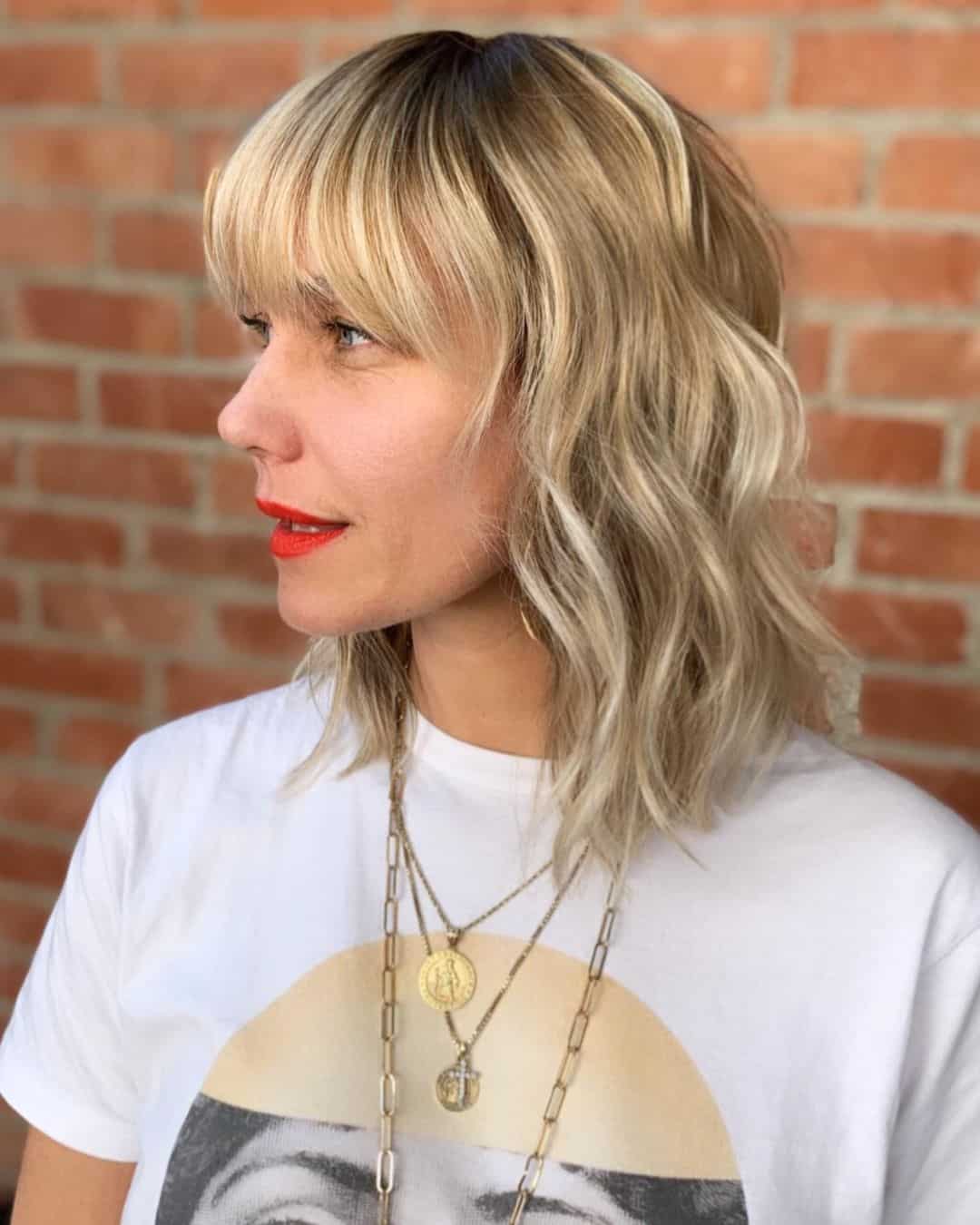 Icy Blonde Wavy Bob with Bangs