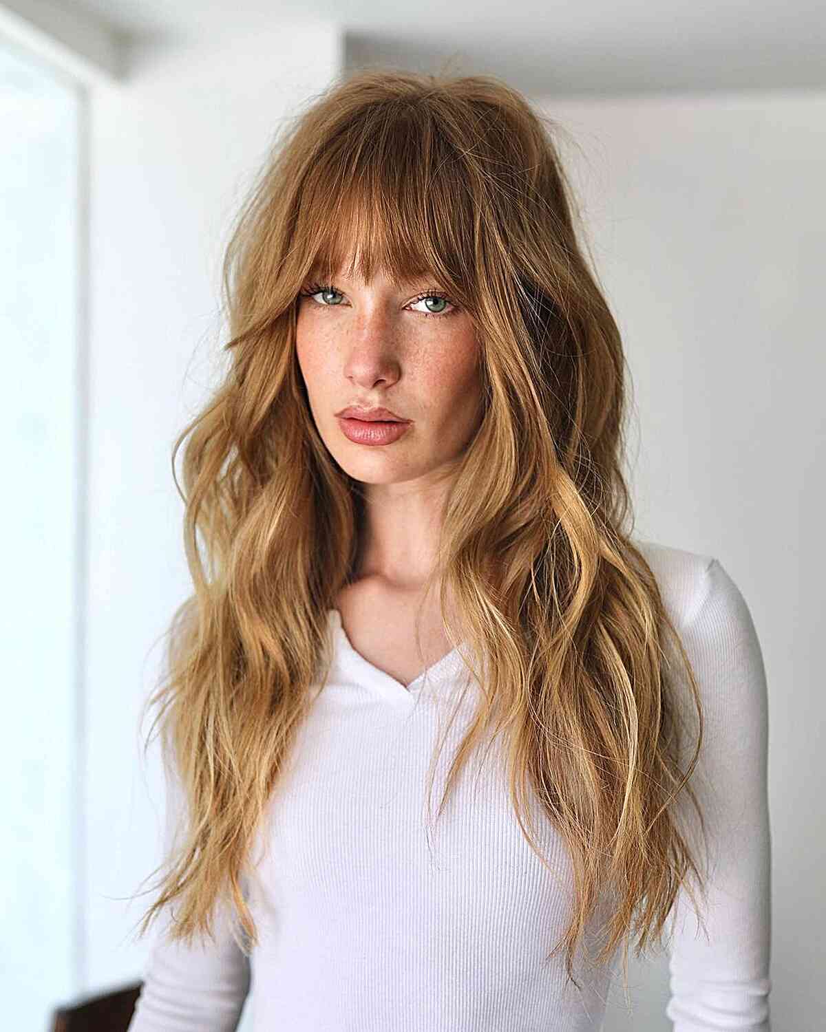 Long Layered Golden Hair with Fringe for women with a long face