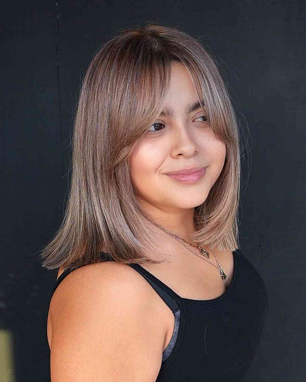 Medium-Length Beige Balayage Bob with Curtain Bangs for Fine Hair