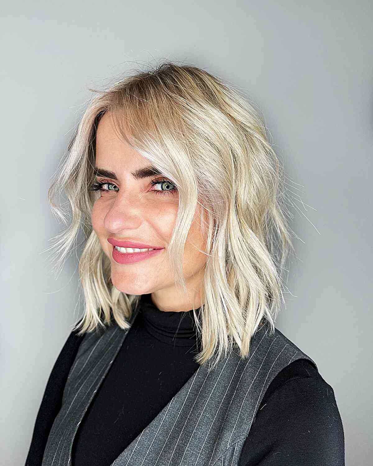 Medium-Length Choppy Blonde Lob for Fine Hair