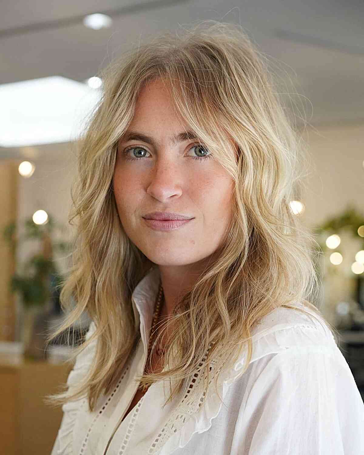 Medium-Length Golden Blonde Balayage for Fine Hair