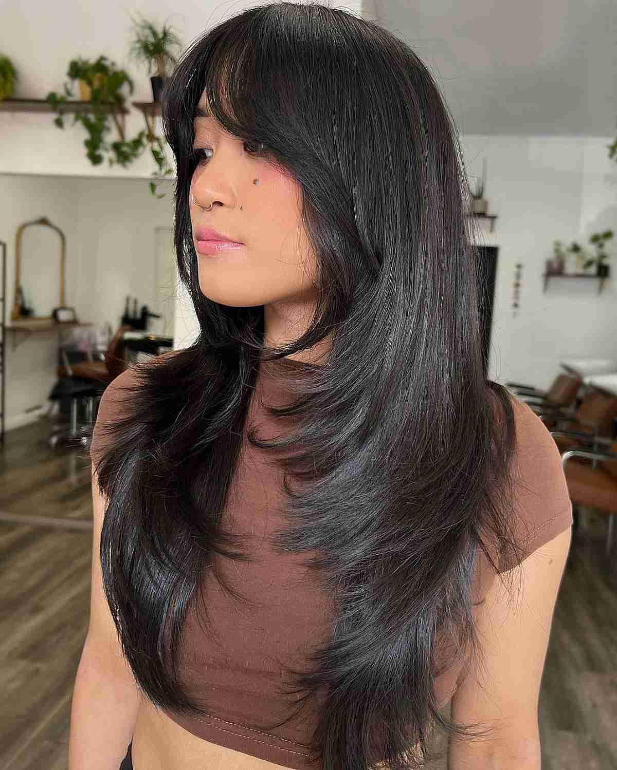 Sexy Long Face-Framing Layers with Wispy Bangs