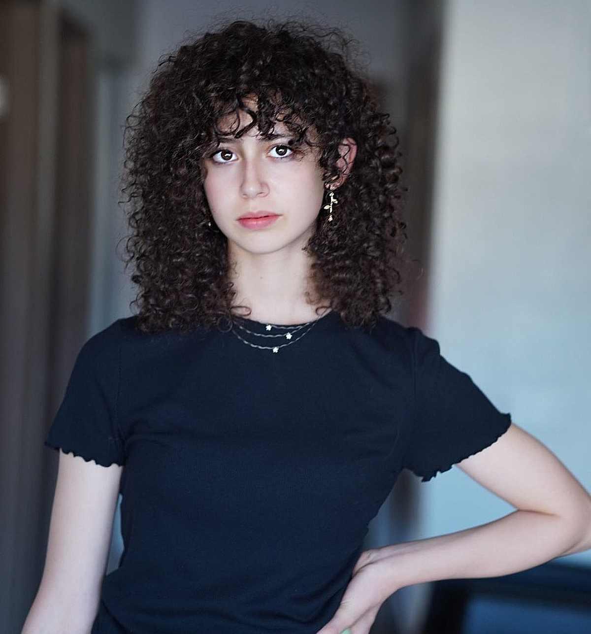 Shoulder-Length Brunette Ringlets with Bangs