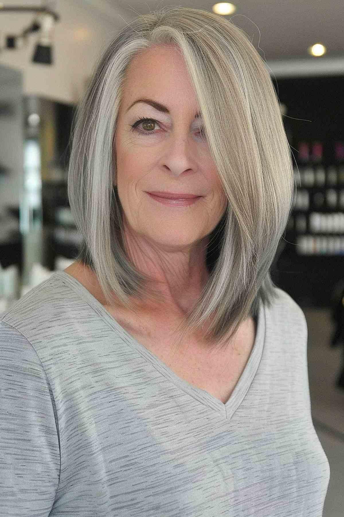 Stylish blunt cut for women over 60 with side part