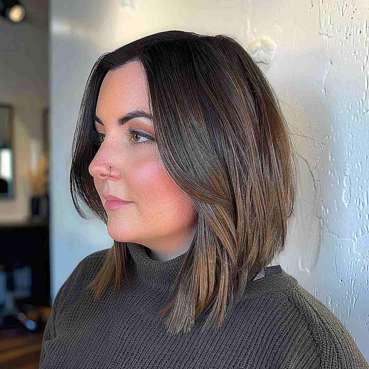 Sweet medium-length angled bob cut for round faces